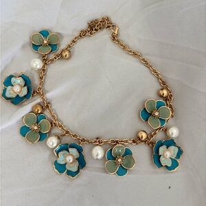 Charming Floral Necklace with Gold and Blue Accents
